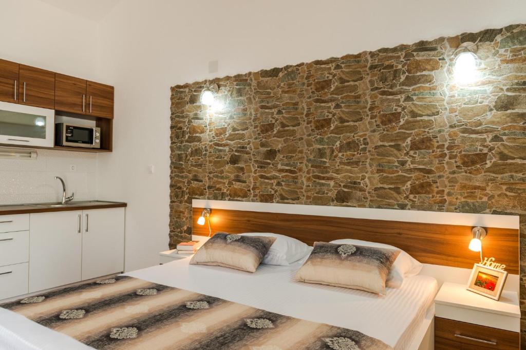 Posteľ alebo postele v izbe v ubytovaní Apartments Stella del Mare