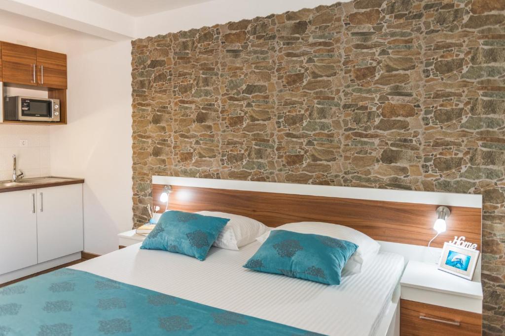 Posteľ alebo postele v izbe v ubytovaní Apartments Stella del Mare