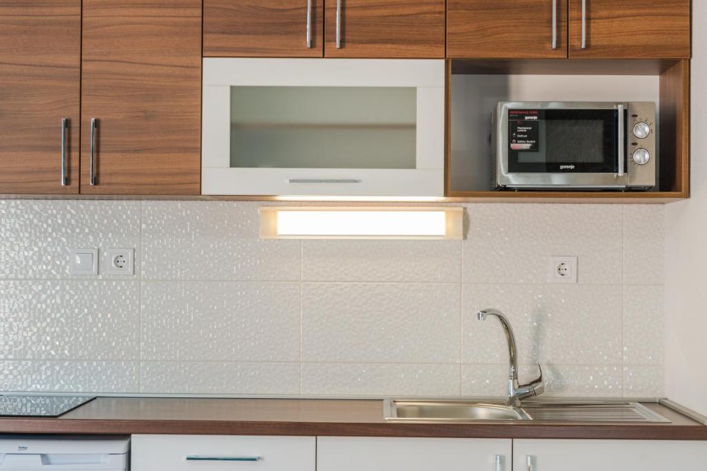 Kuchyňa alebo kuchynka v ubytovaní Apartments Stella del Mare