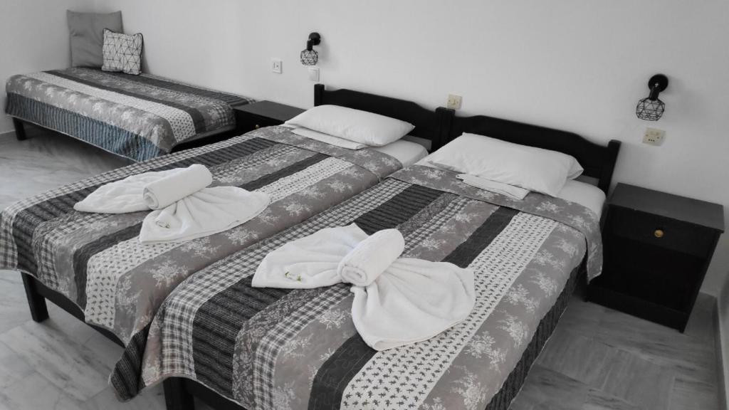 A bed or beds in a room at Arellis