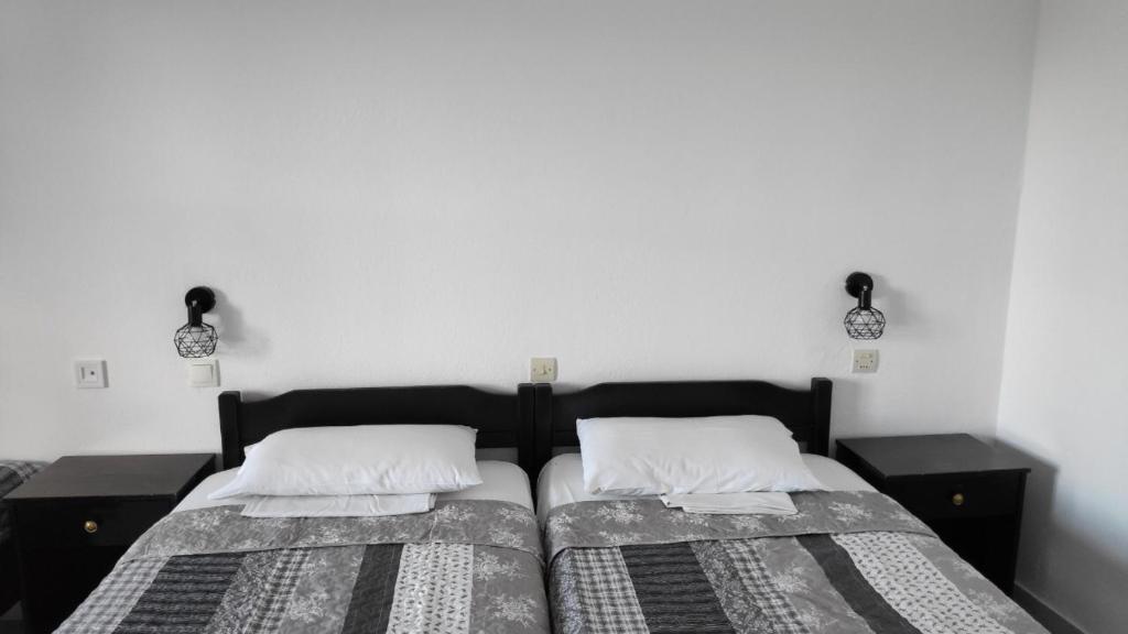 A bed or beds in a room at Arellis