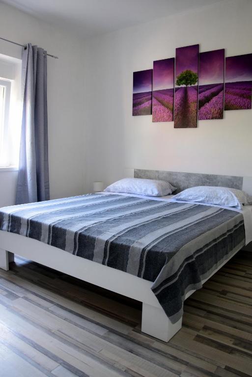 Postel nebo postele na pokoji v ubytování Apartman Ana