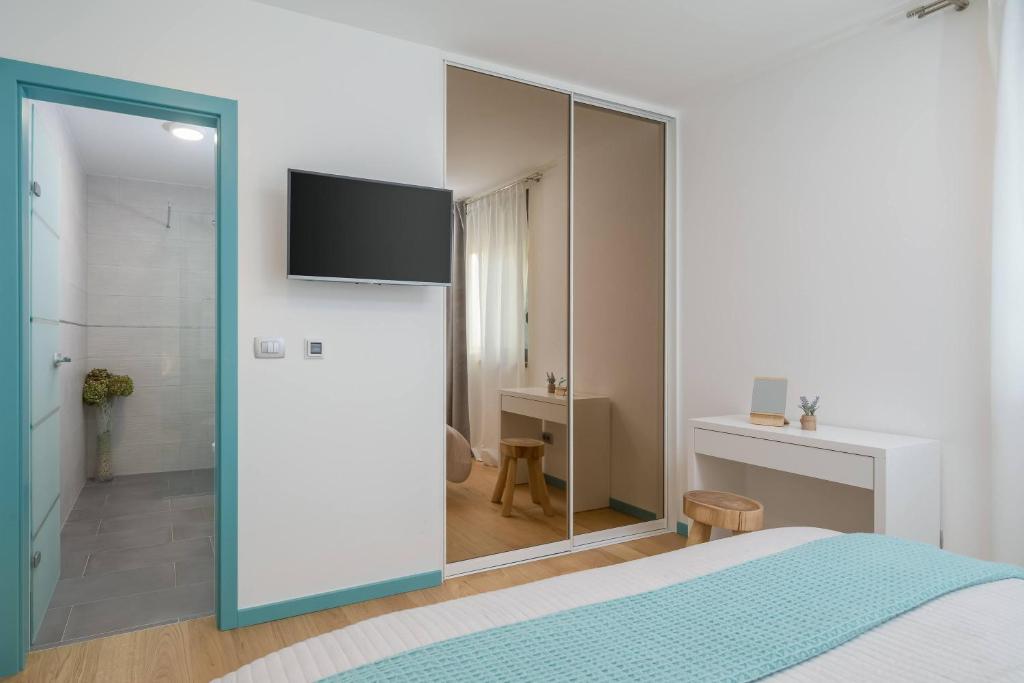 Posteľ alebo postele v izbe v ubytovaní Villa Marulovo Hills