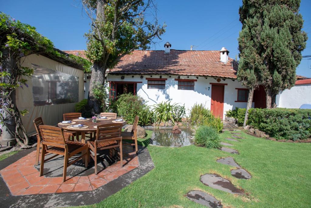 Un jardín fuera de La Casa Azul Huasca & Restaurante La Terraza