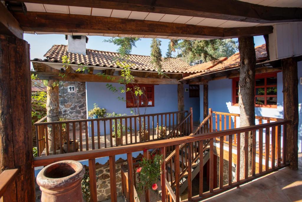 Un balcón o terraza en La Casa Azul Huasca & Restaurante La Terraza