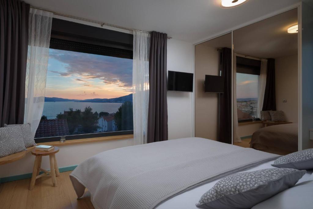 Posteľ alebo postele v izbe v ubytovaní Villa Marulovo Hills