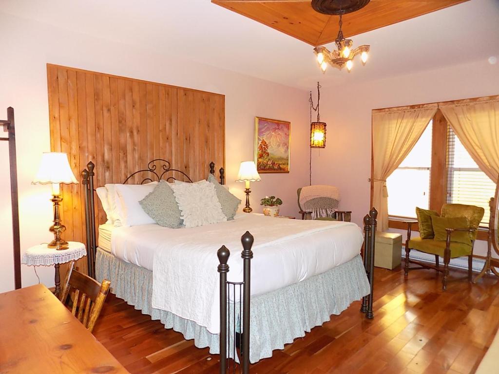 Postel nebo postele na pokoji v ubytování À L'Ancestrale B&B