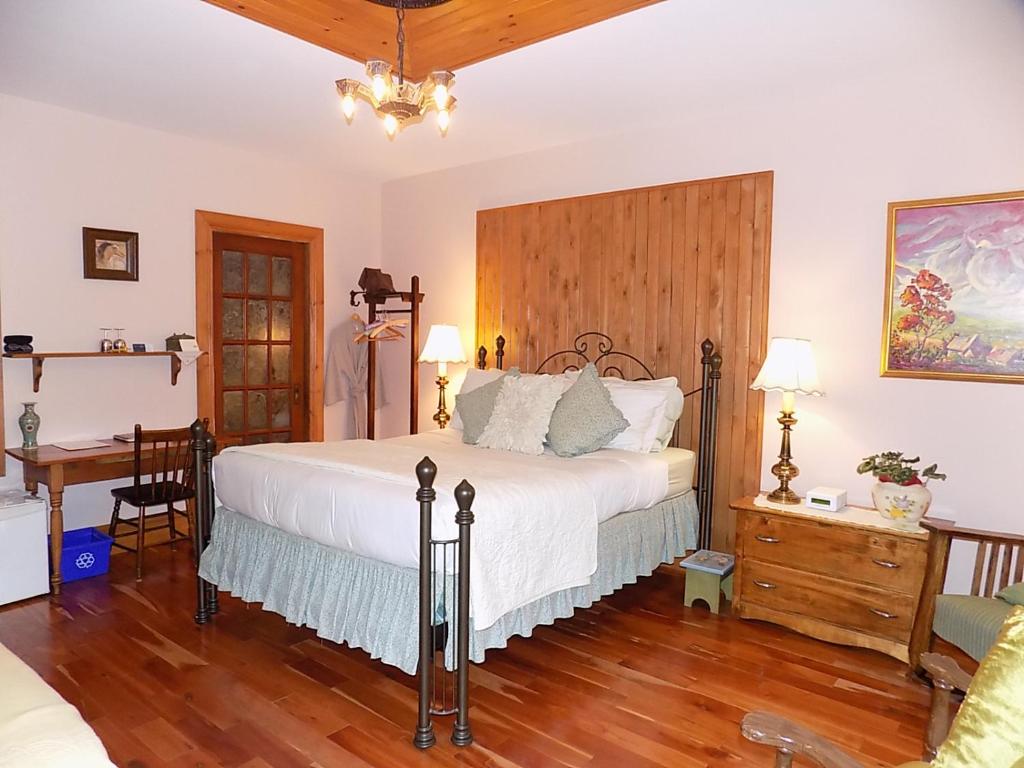 Postel nebo postele na pokoji v ubytování À L'Ancestrale B&B