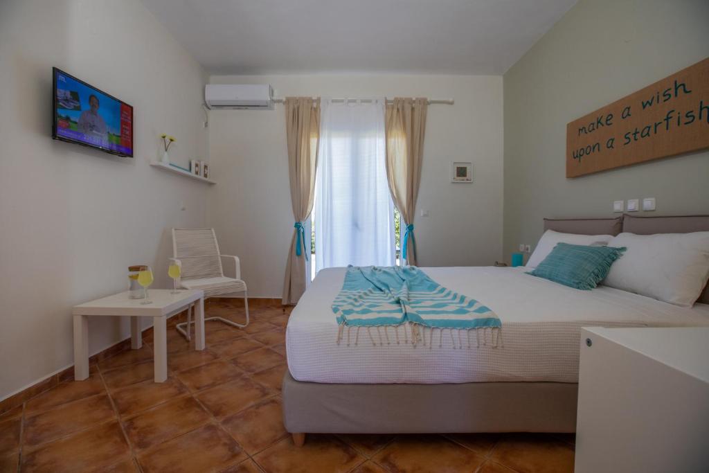 Postel nebo postele na pokoji v ubytování Sea View Studios