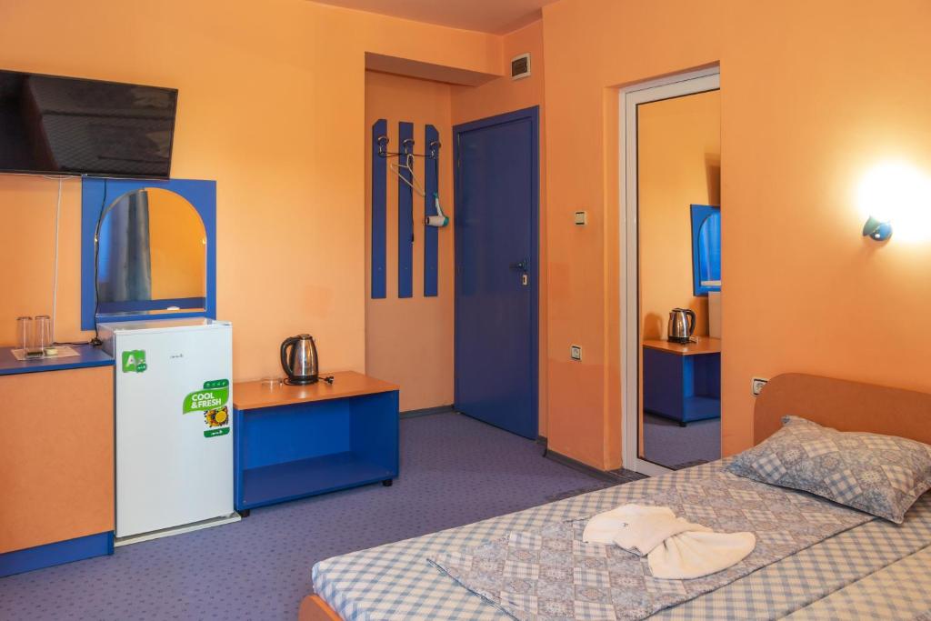 Postel nebo postele na pokoji v ubytování Dara Hotel