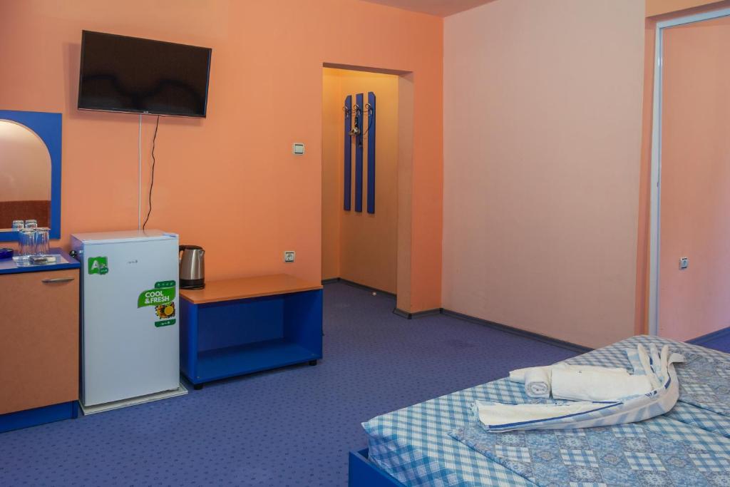 Postel nebo postele na pokoji v ubytování Dara Hotel
