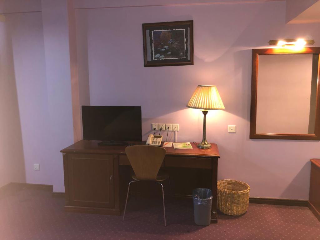 TV a/nebo společenská místnost v ubytování King Park Hotel Tawau