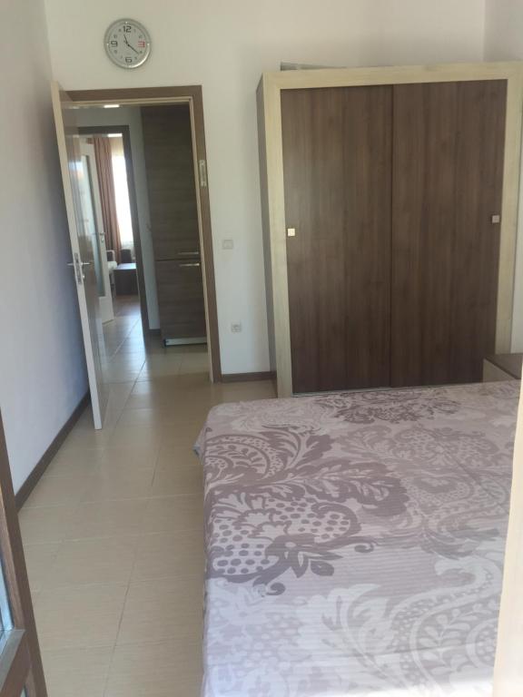 A bed or beds in a room at Apartment on the sea at St Nikolas Complex-Elena