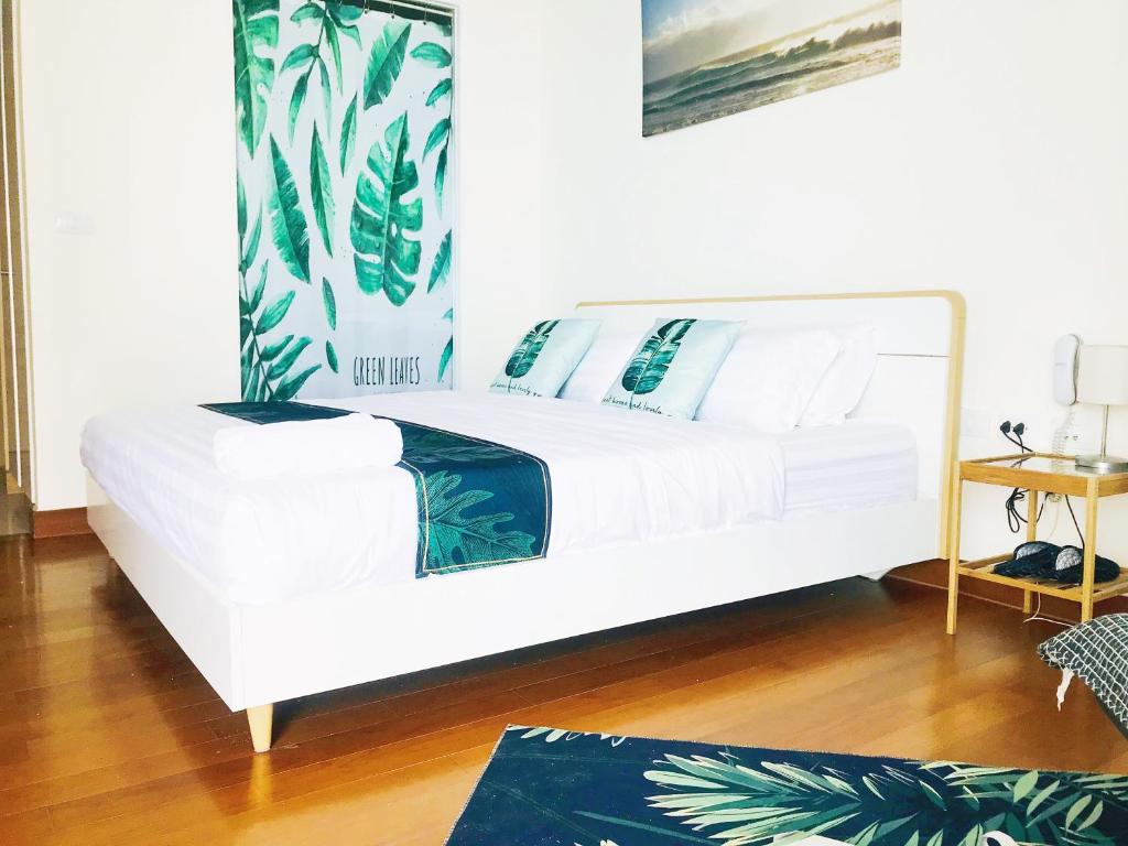 Postel nebo postele na pokoji v ubytování Pattaya Private Beach Luxury Home