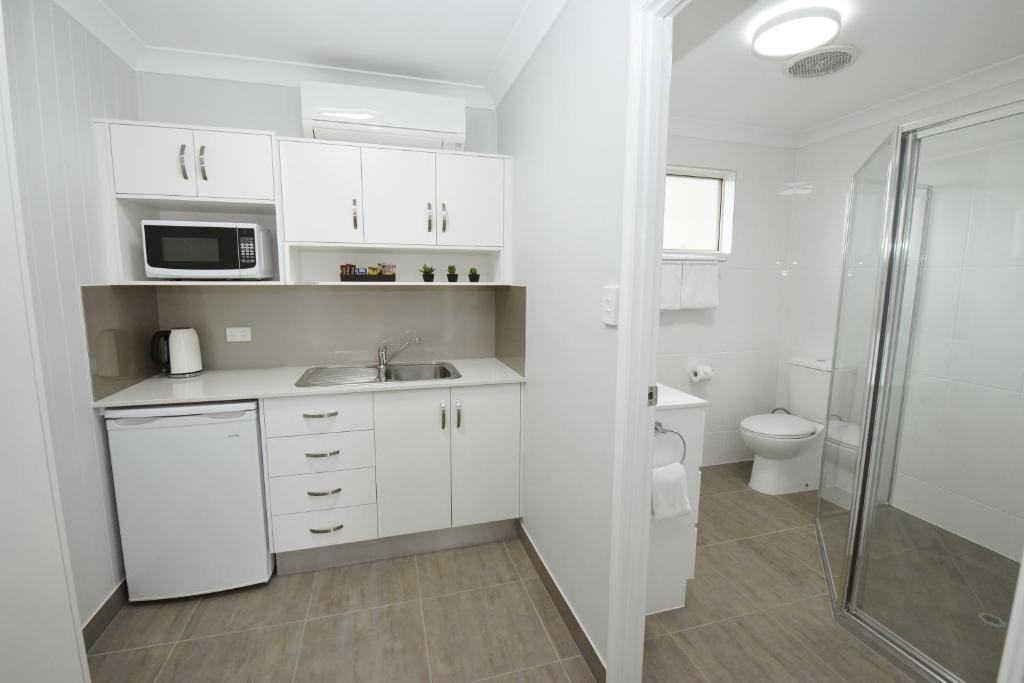 Koupelna v ubytování Raintree Motel Biloela