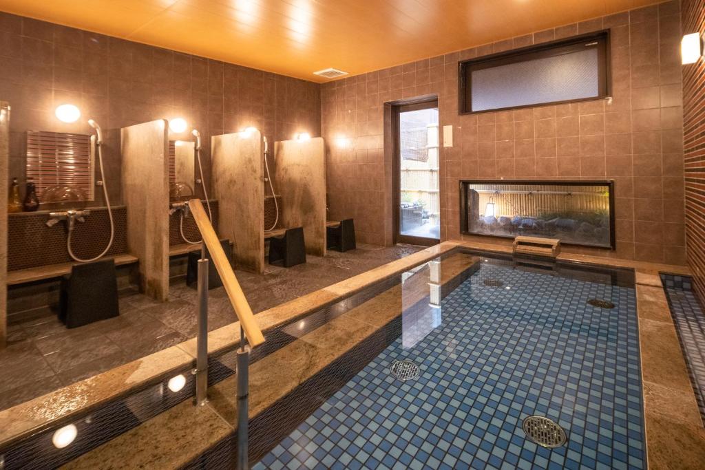 TV a/nebo společenská místnost v ubytování Hotel Kuu Kyoto