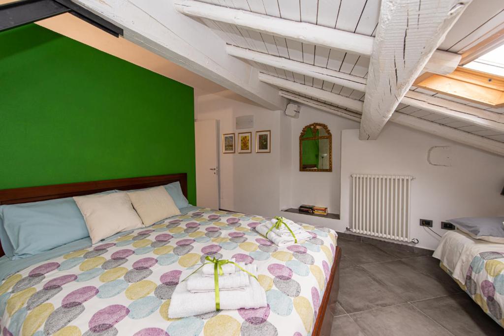 Postel nebo postele na pokoji v ubytování B&B Il Tetto di Anita