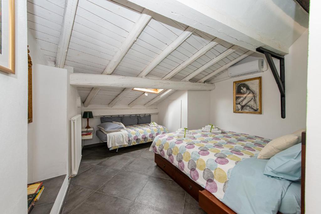 Postel nebo postele na pokoji v ubytování B&B Il Tetto di Anita