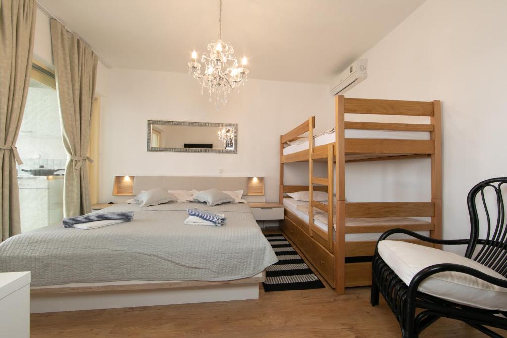 Posteľ alebo postele v izbe v ubytovaní Punta Rata apartment