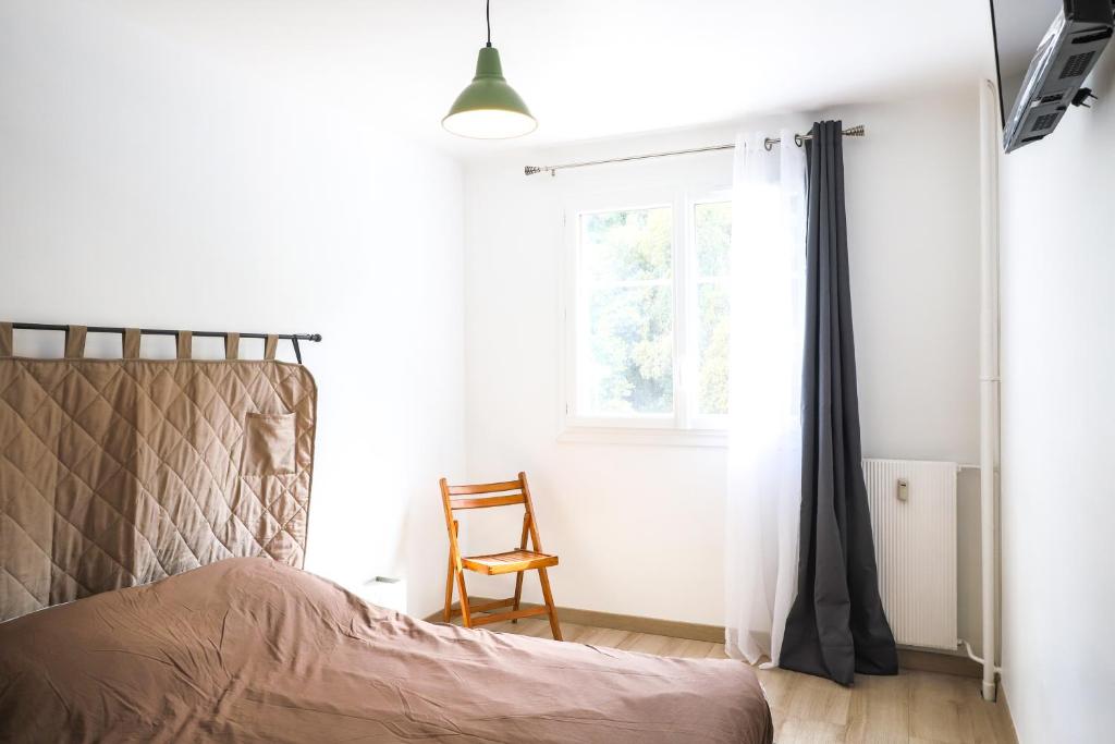 Postel nebo postele na pokoji v ubytování La Provence