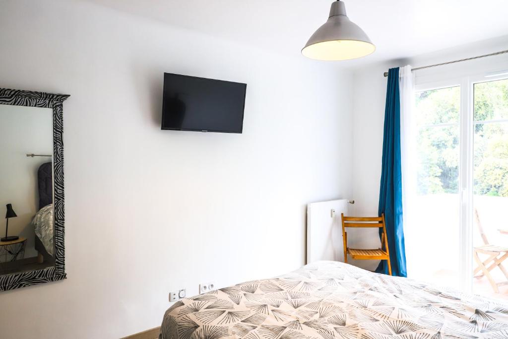 Postel nebo postele na pokoji v ubytování La Provence