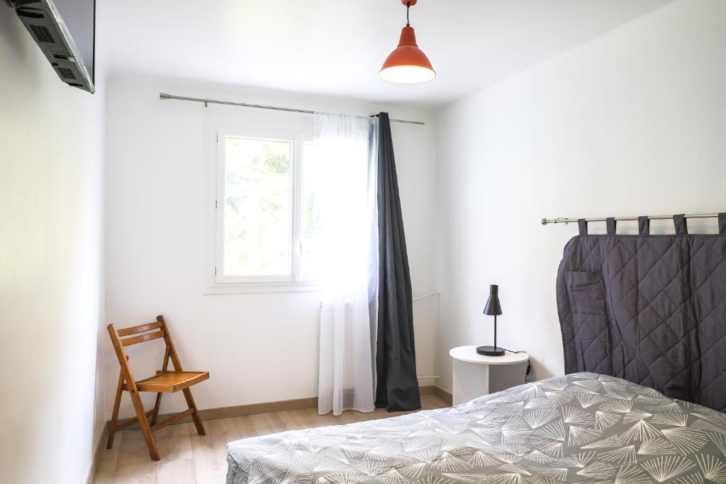 Postel nebo postele na pokoji v ubytování La Provence