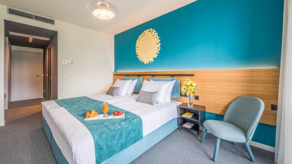 Postel nebo postele na pokoji v ubytování Hotel Nestos