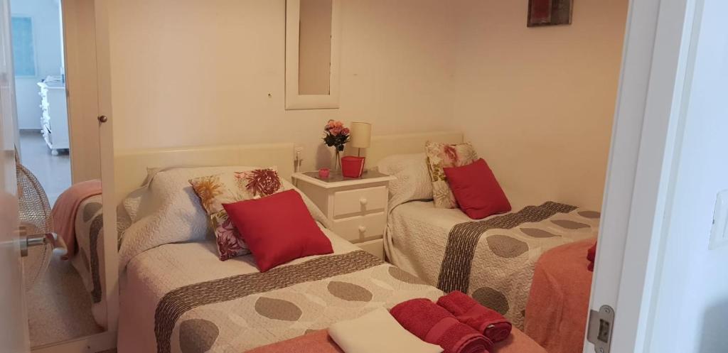 Łóżko lub łóżka w pokoju w obiekcie Apartment Edificio Sur 19