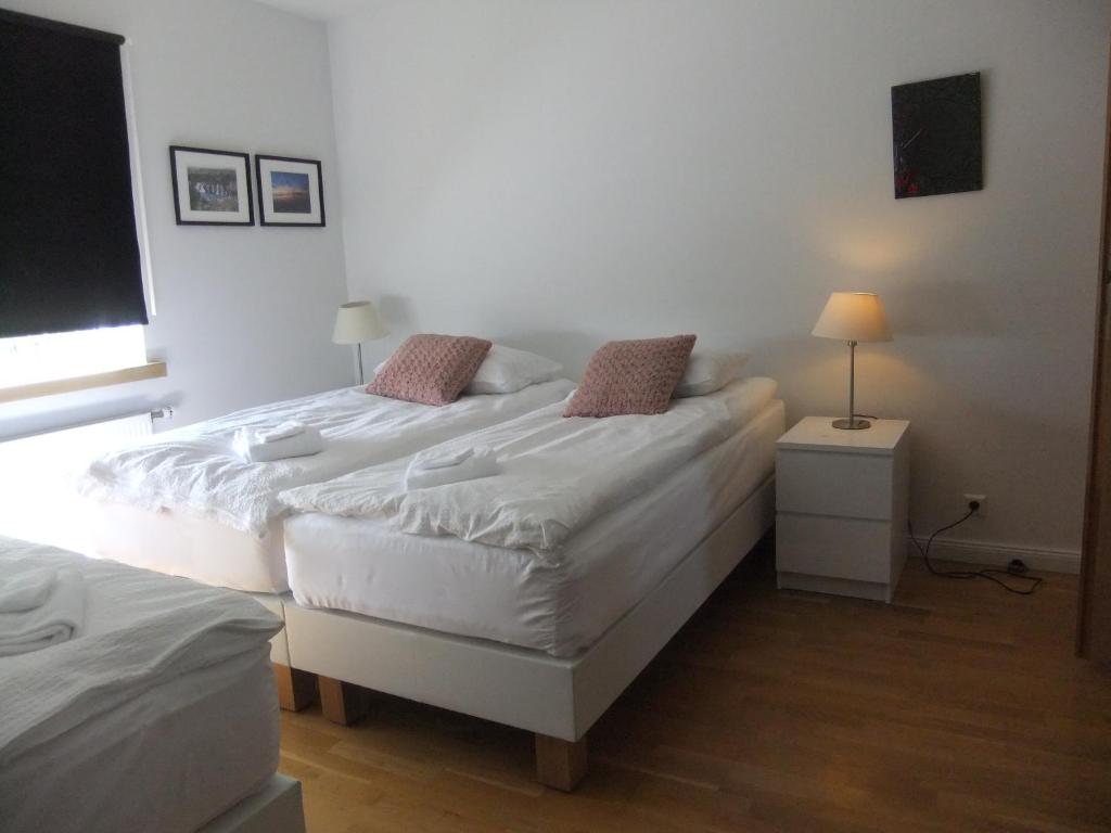 Cama o camas de una habitación en Akra Guesthouse