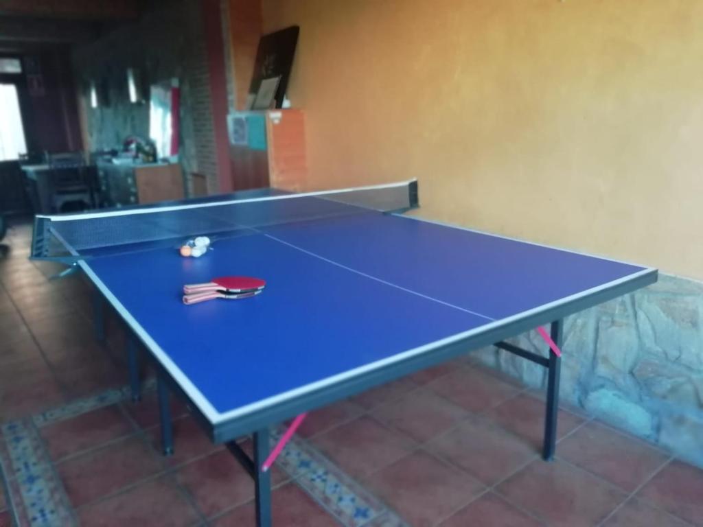 Stolní tenis v ubytování Boleta A 5 minutos de León, casa con jardín nebo okolí