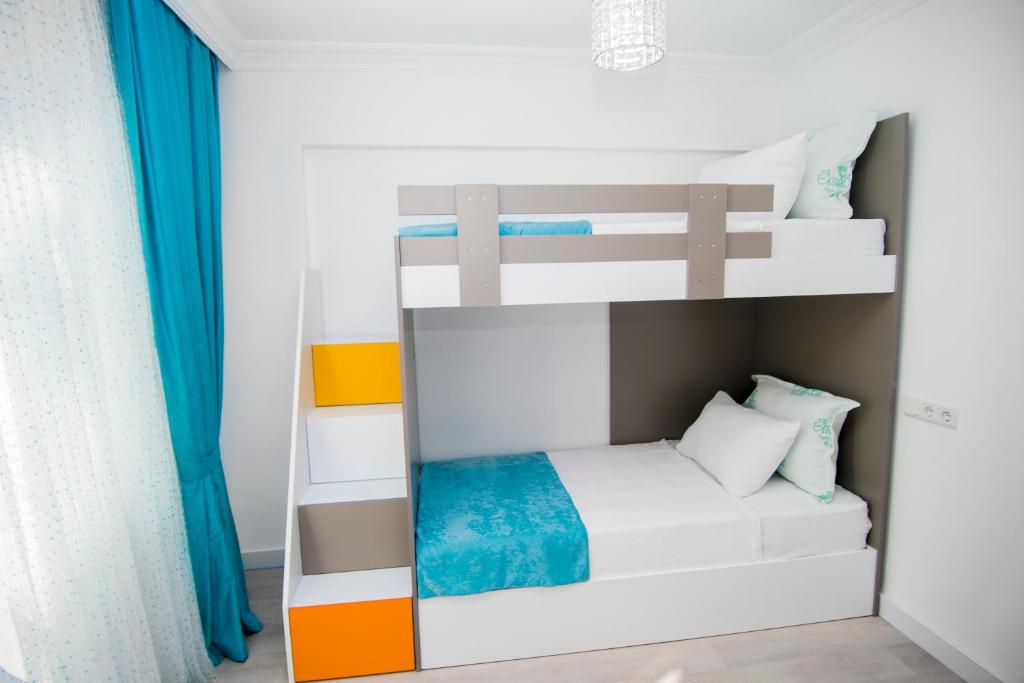 Postel nebo postele na pokoji v ubytování Ocean Blue High Class Hotel & SPA