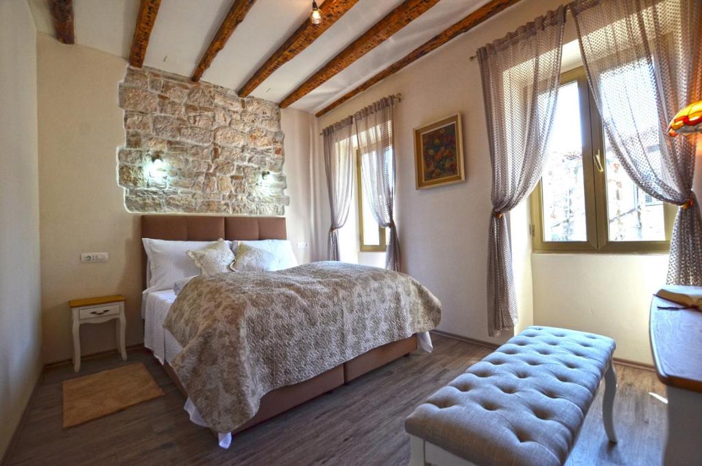 Posteľ alebo postele v izbe v ubytovaní Bruno Apartment