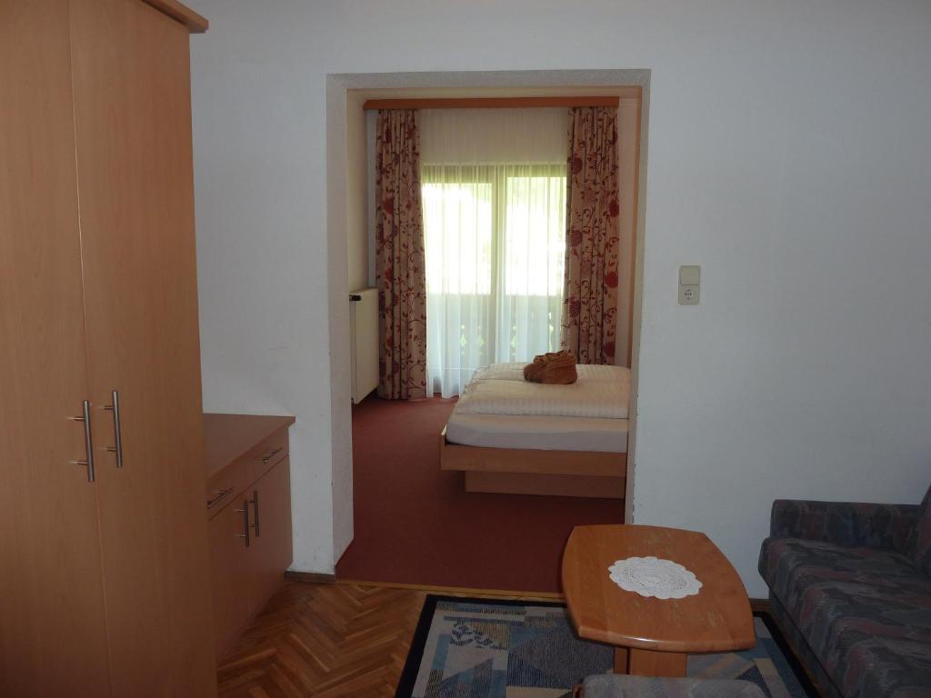 Postel nebo postele na pokoji v ubytování Alpenhotel Badmeister