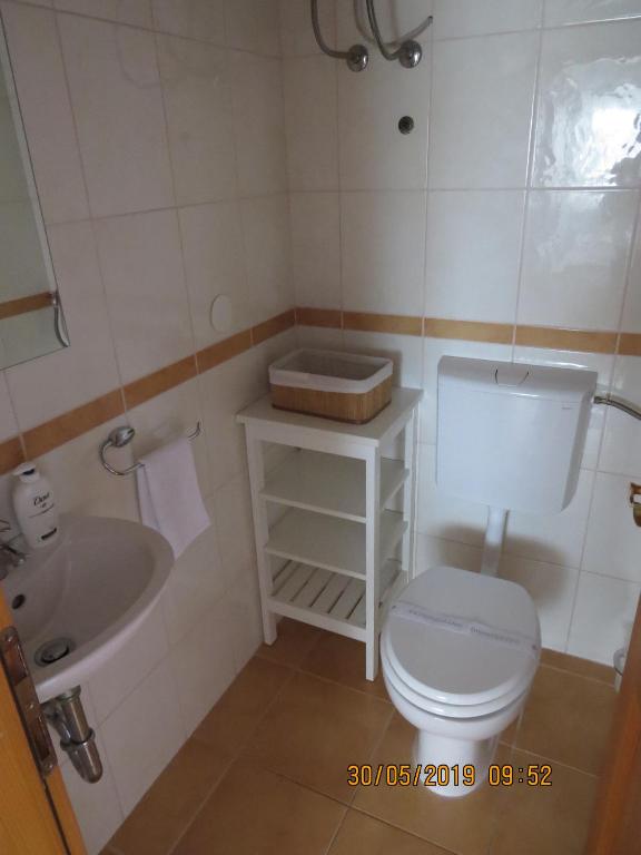 Ванная комната в Apartments Loncar-near Zrće beach