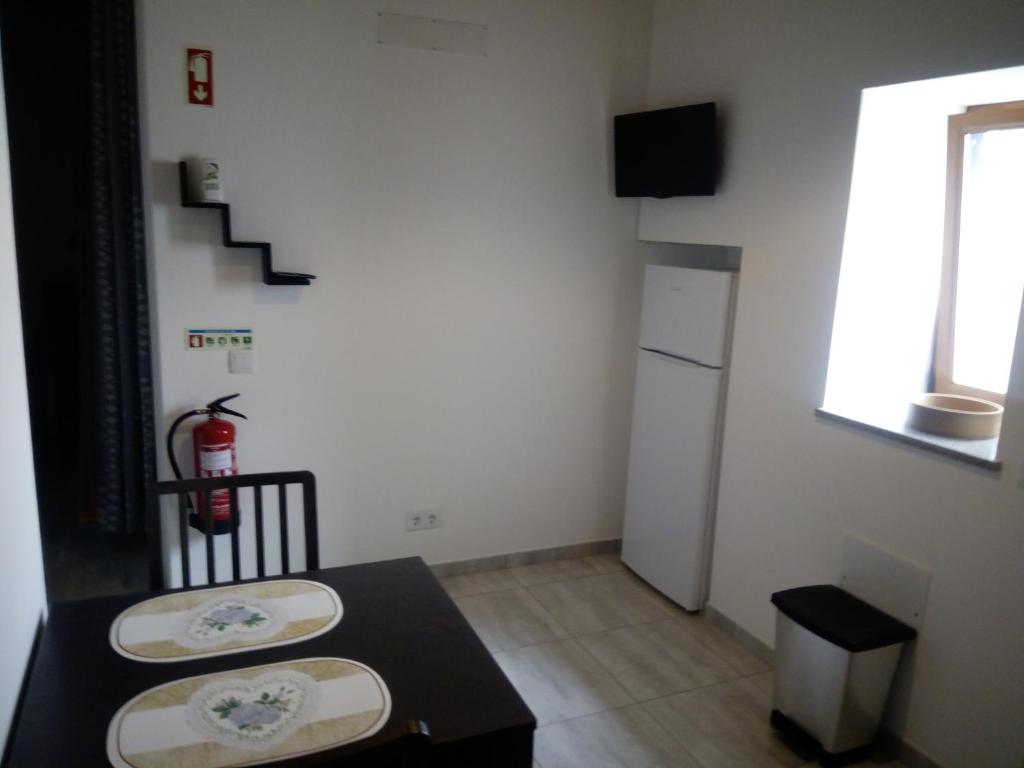 TV a/nebo společenská místnost v ubytování O Nosso Lar
