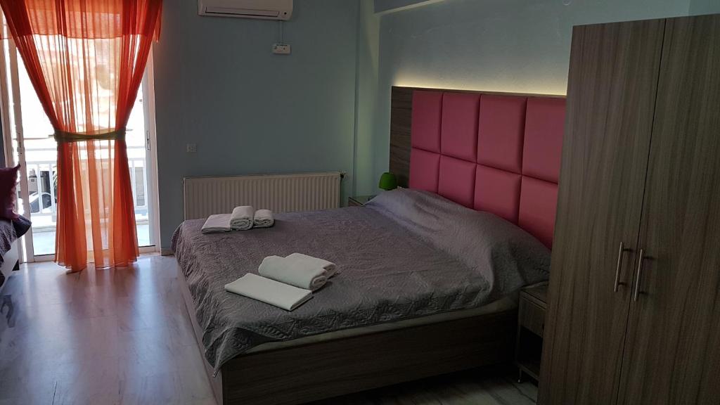 Postel nebo postele na pokoji v ubytování Hotel White Rose Beach