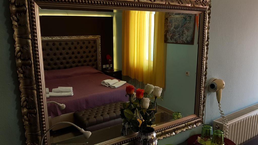 Postel nebo postele na pokoji v ubytování Hotel White Rose Beach