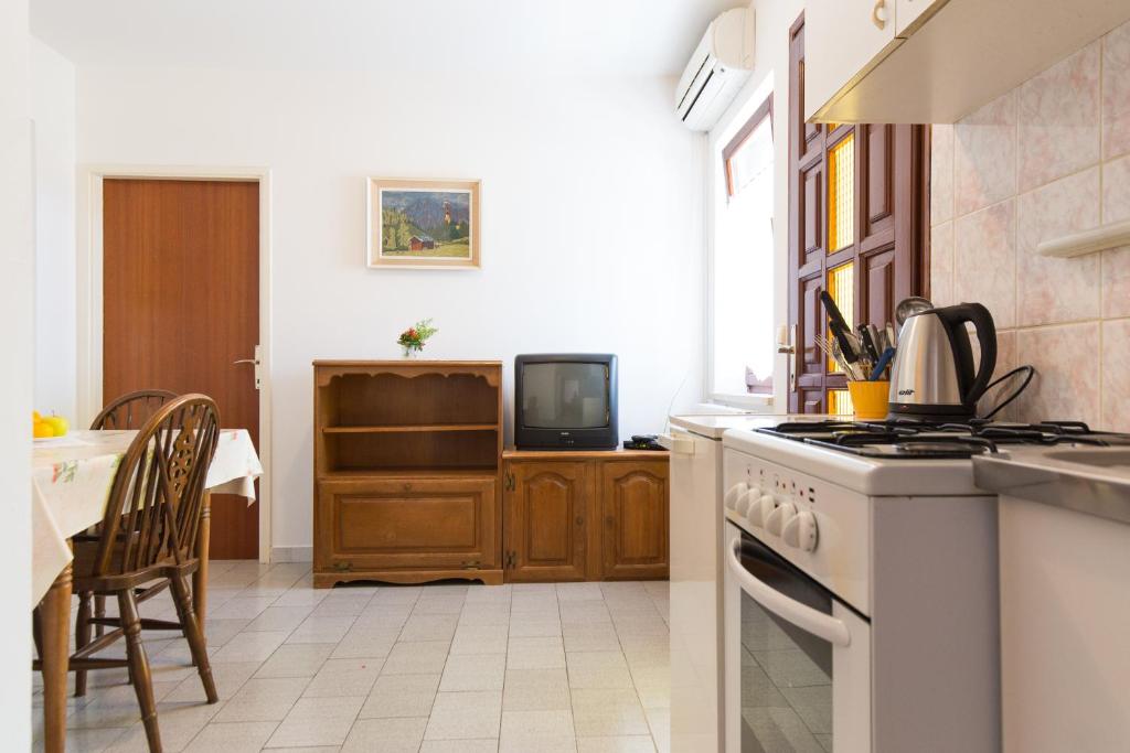 Kuchyňa alebo kuchynka v ubytovaní Apartment Pavacic