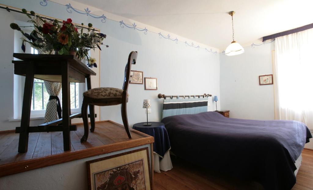 Postel nebo postele na pokoji v ubytování B&B Il Molinello