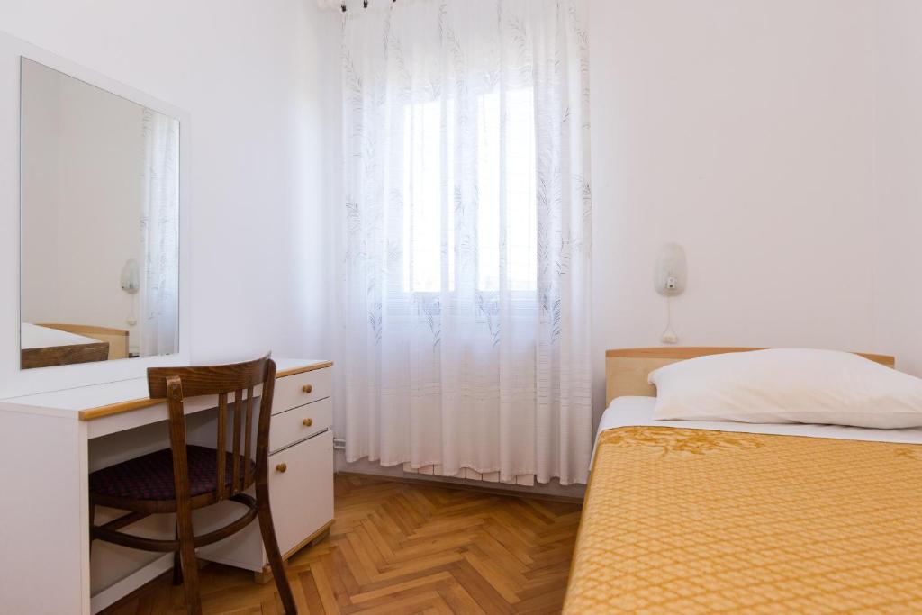 Posteľ alebo postele v izbe v ubytovaní Apartment Pavacic