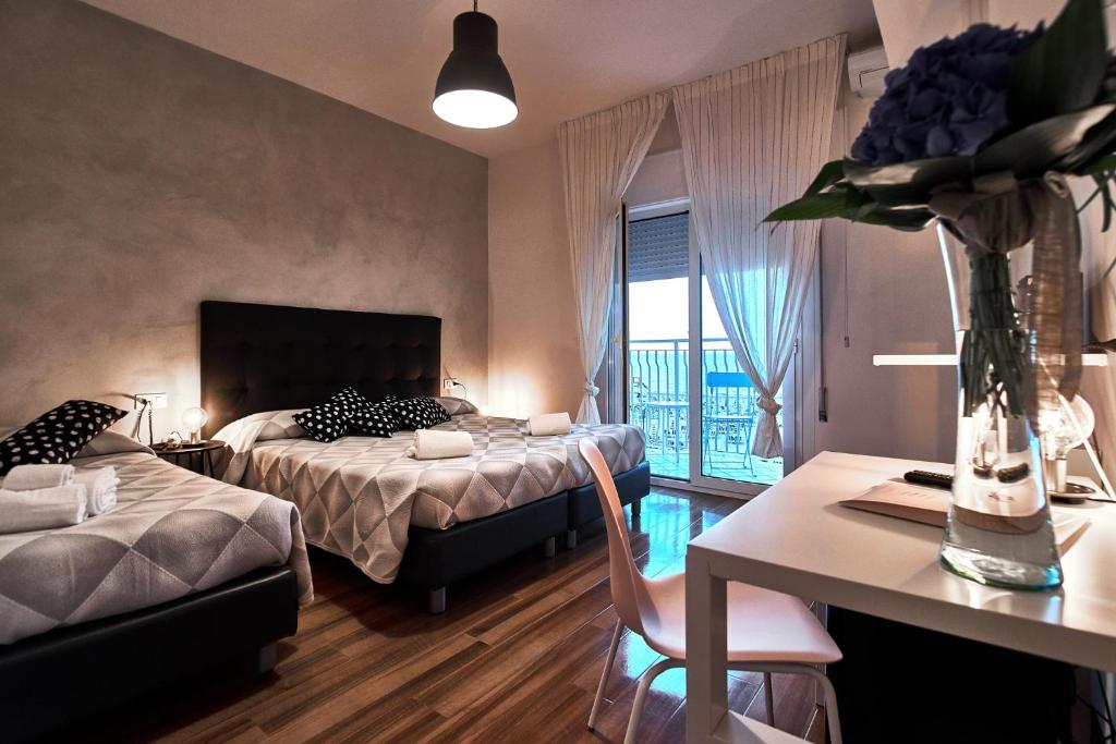 Postel nebo postele na pokoji v ubytování Hotel Concordia