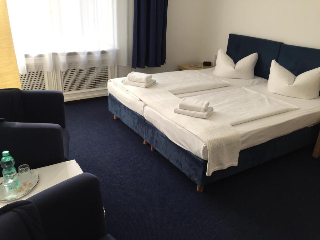 Postel nebo postele na pokoji v ubytování Hotel Seifert Berlin am Kurfürstendamm