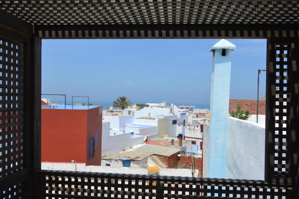 a view of a city from a window at RIAD OASIS D'ASILAH in Asilah