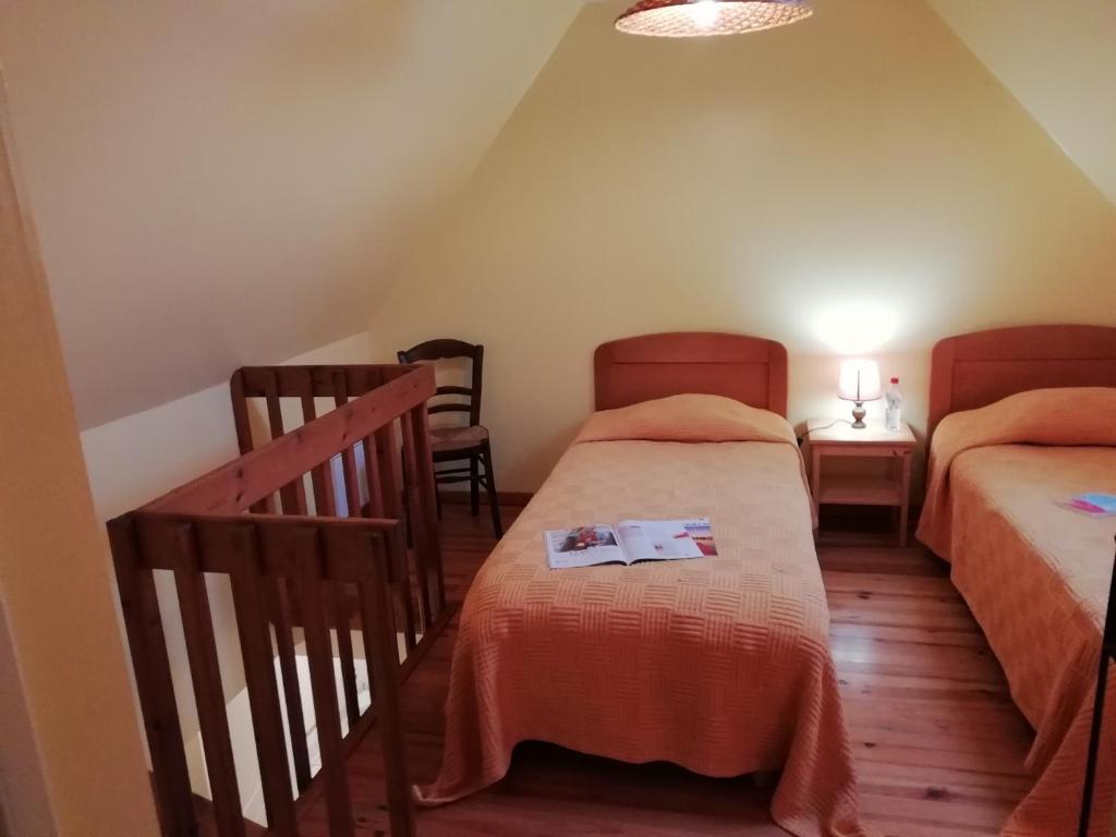 Postel nebo postele na pokoji v ubytování Chambres d'hôtes Edoniaa