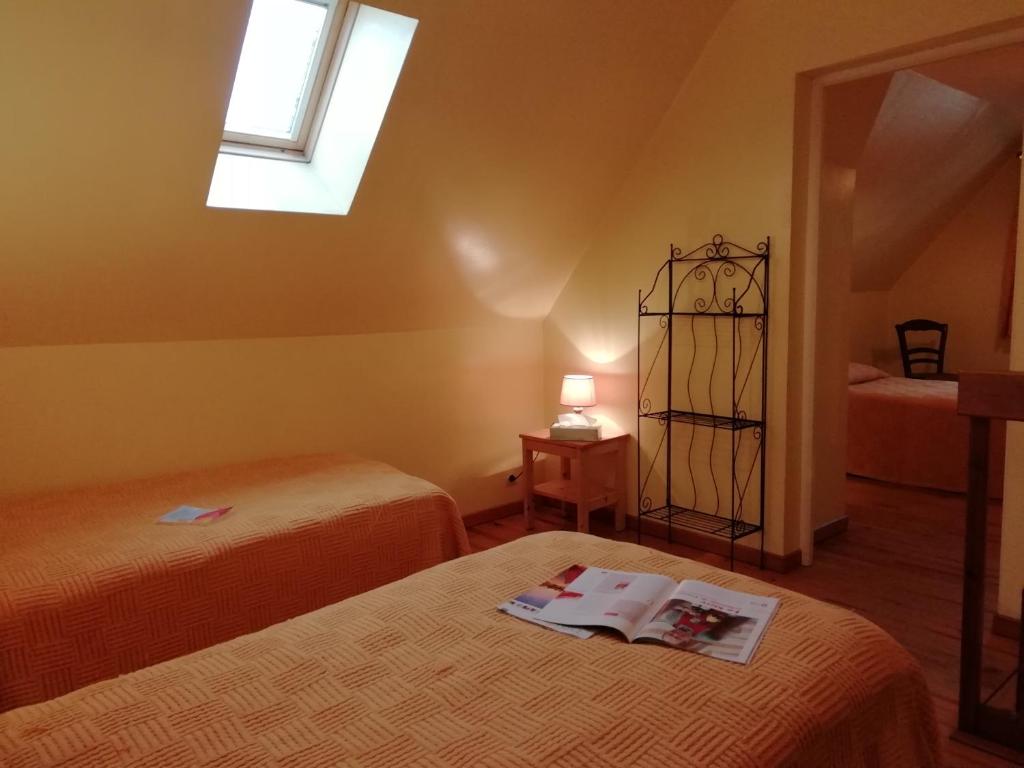 Postel nebo postele na pokoji v ubytování Chambres d'hôtes Edoniaa