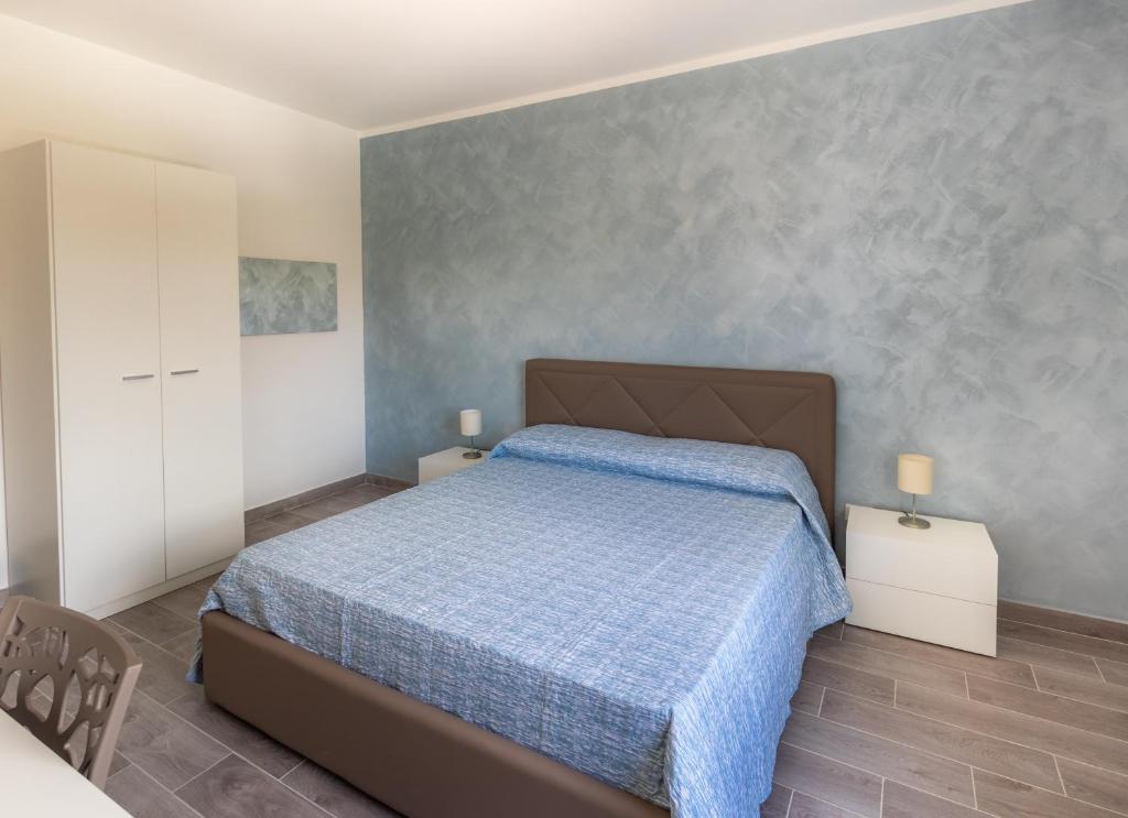 Postel nebo postele na pokoji v ubytování L'Antico Borgo B&B