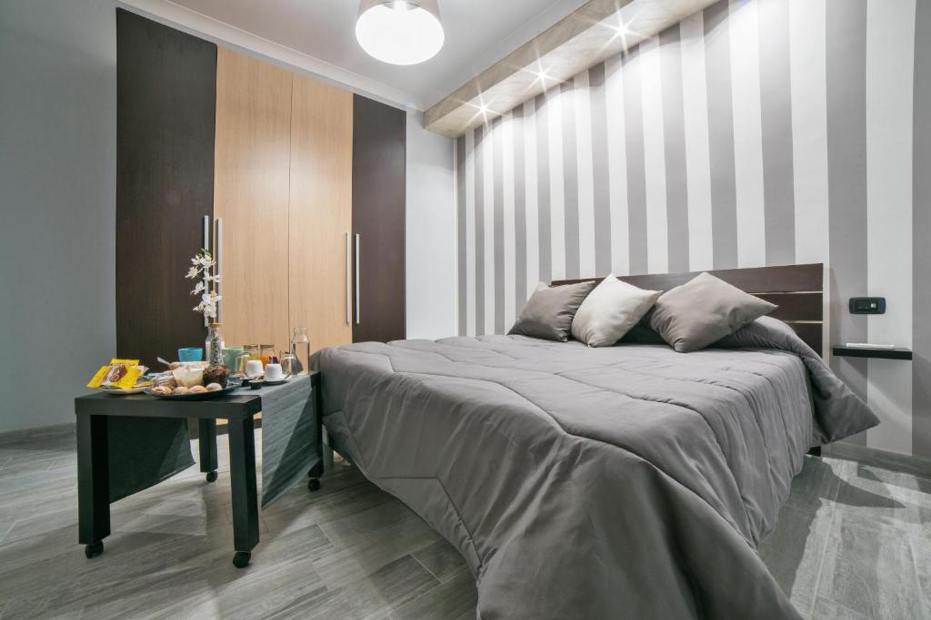 Postel nebo postele na pokoji v ubytování B&B del Sole