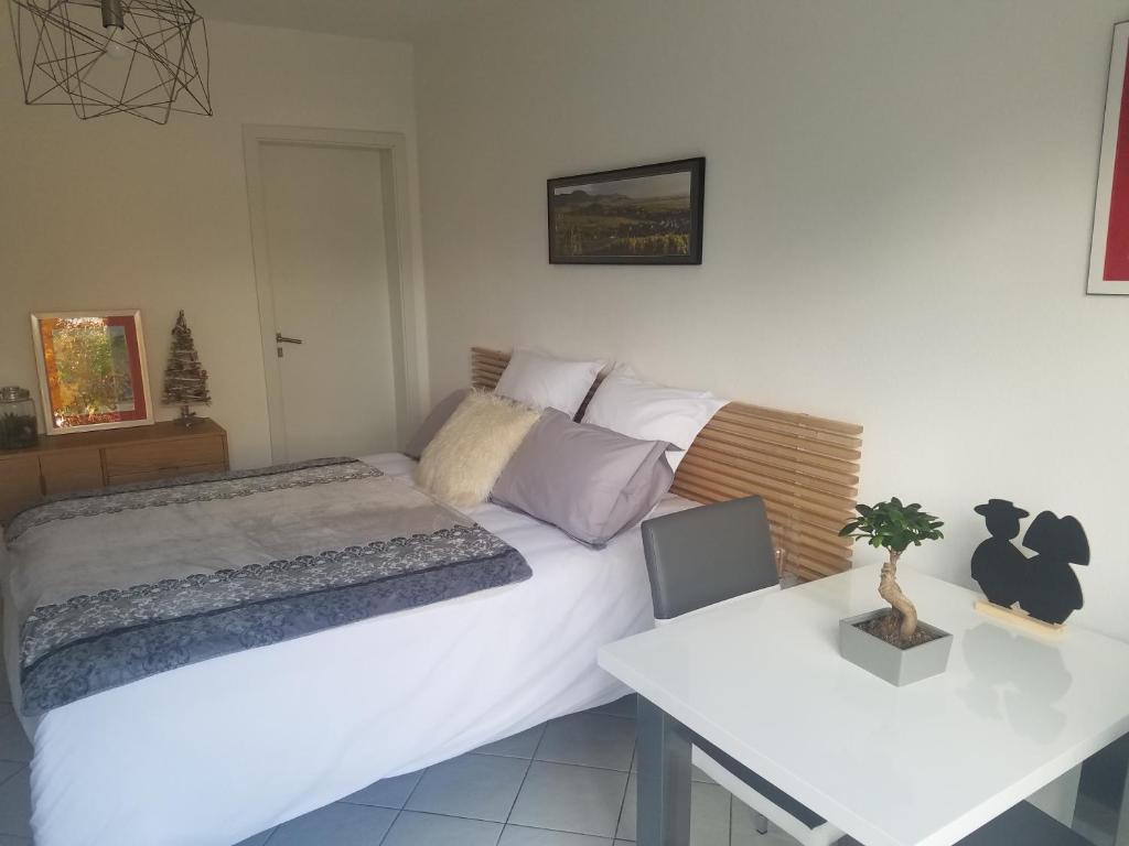 Postel nebo postele na pokoji v ubytování Les mésanges de l'Ill