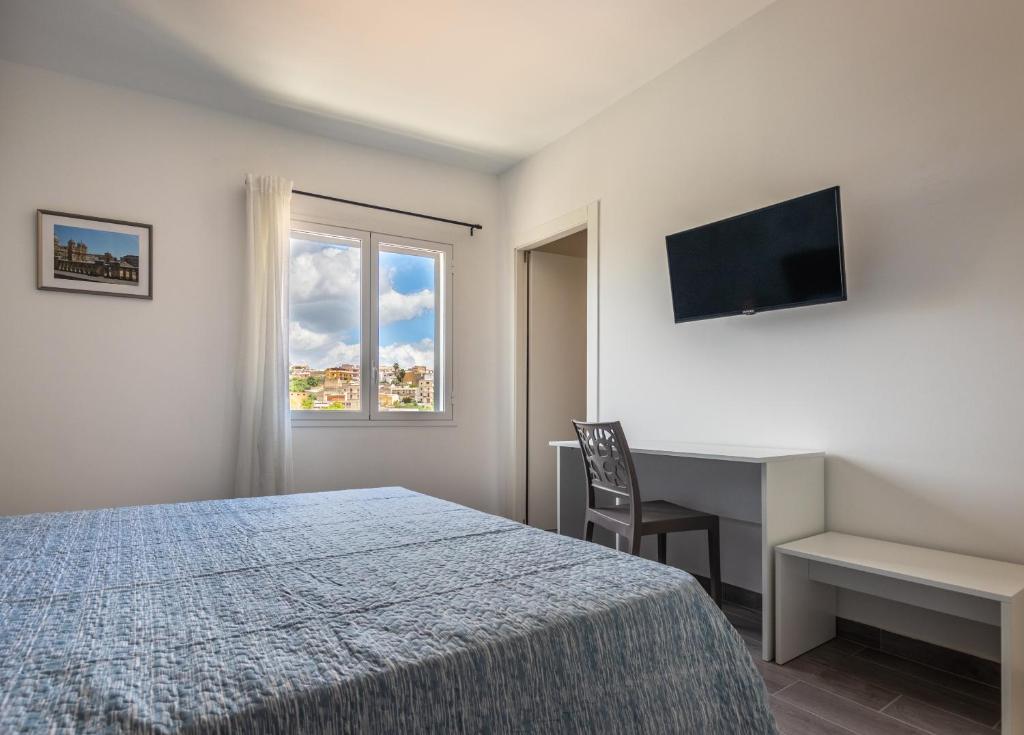 TV a/nebo společenská místnost v ubytování L'Antico Borgo B&B