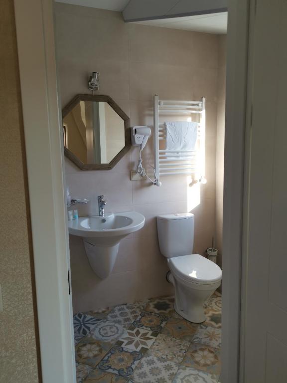 Koupelna v ubytování Boutique Hotel BelleVue